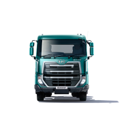 Truk besar warna hijau tua tampak dari depan dengan latar belakang putih.